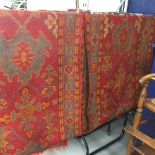 Carpets & Rugs: A pair of 20th cent. Turkey runners, red ground, four gules with blue and red