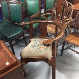 Early Georgian walnut high back corner chair, carved 'acanthus' shell decoration above a club