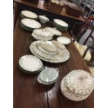 Ceramics: Royal Doulton 'Jacobean' dinner service. Complete dinner service decorated with garland