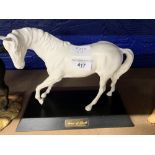 20th cent. Ceramics: Beswick "Spirit of Youth" matt white horse on plinth. Model number 2703.