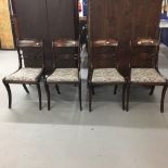 19th cent. Rosewood sabre leg dining chairs with drop in seats. (4)