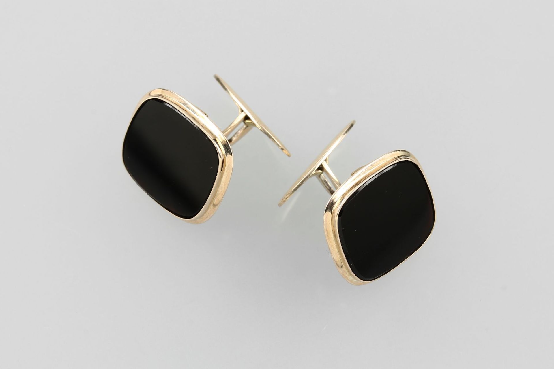 Paar 8 kt Gold Manschettenknöpfe mit Onyx, GG 333/000, eingelegte Onyxplatte, ca. 9.3 gPair of 8