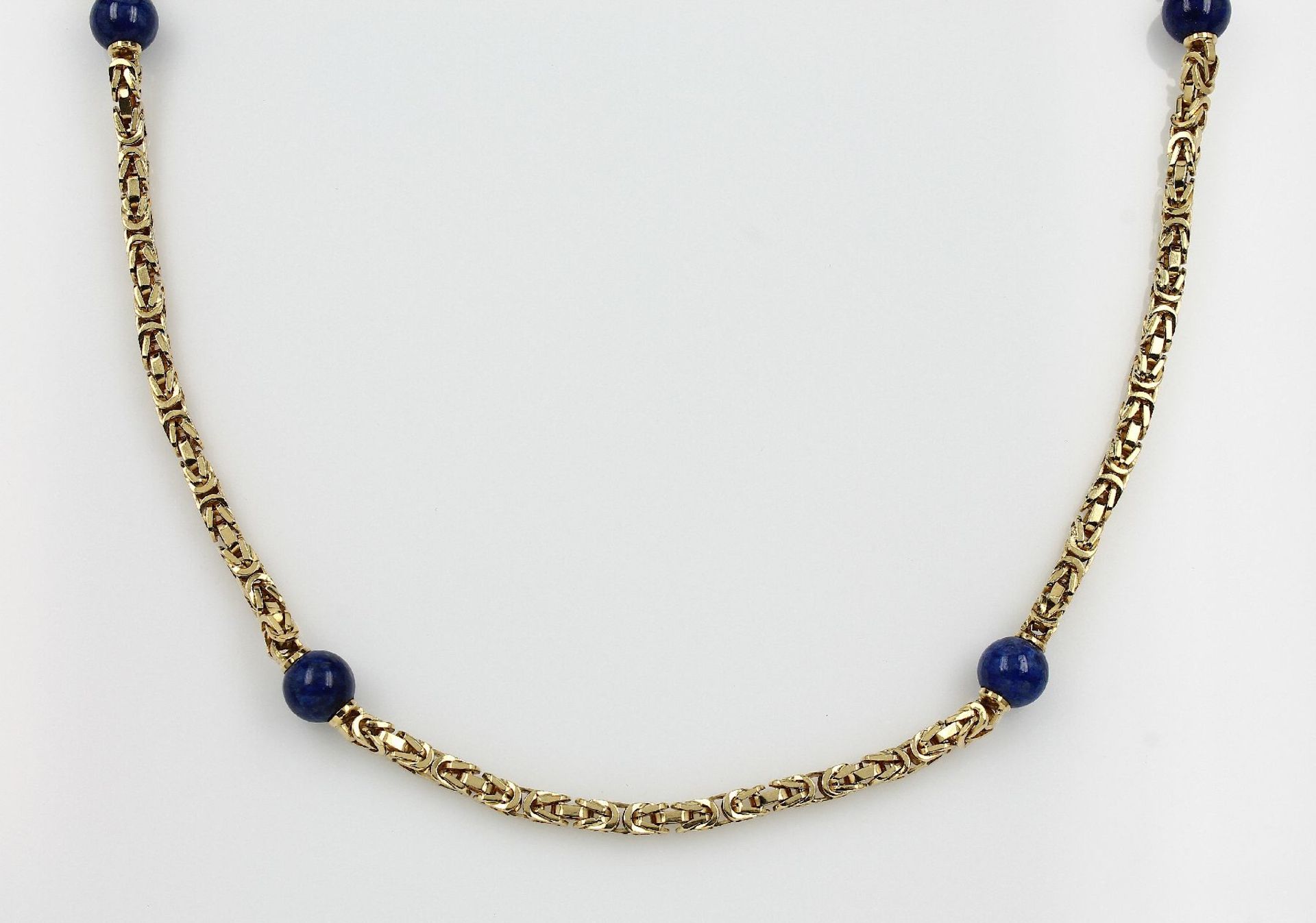 18 kt Königscollier mit Lapislazuli GG 750/000, 9 Lapislazulizwischenkugeln D ca. 9.1 mm, total