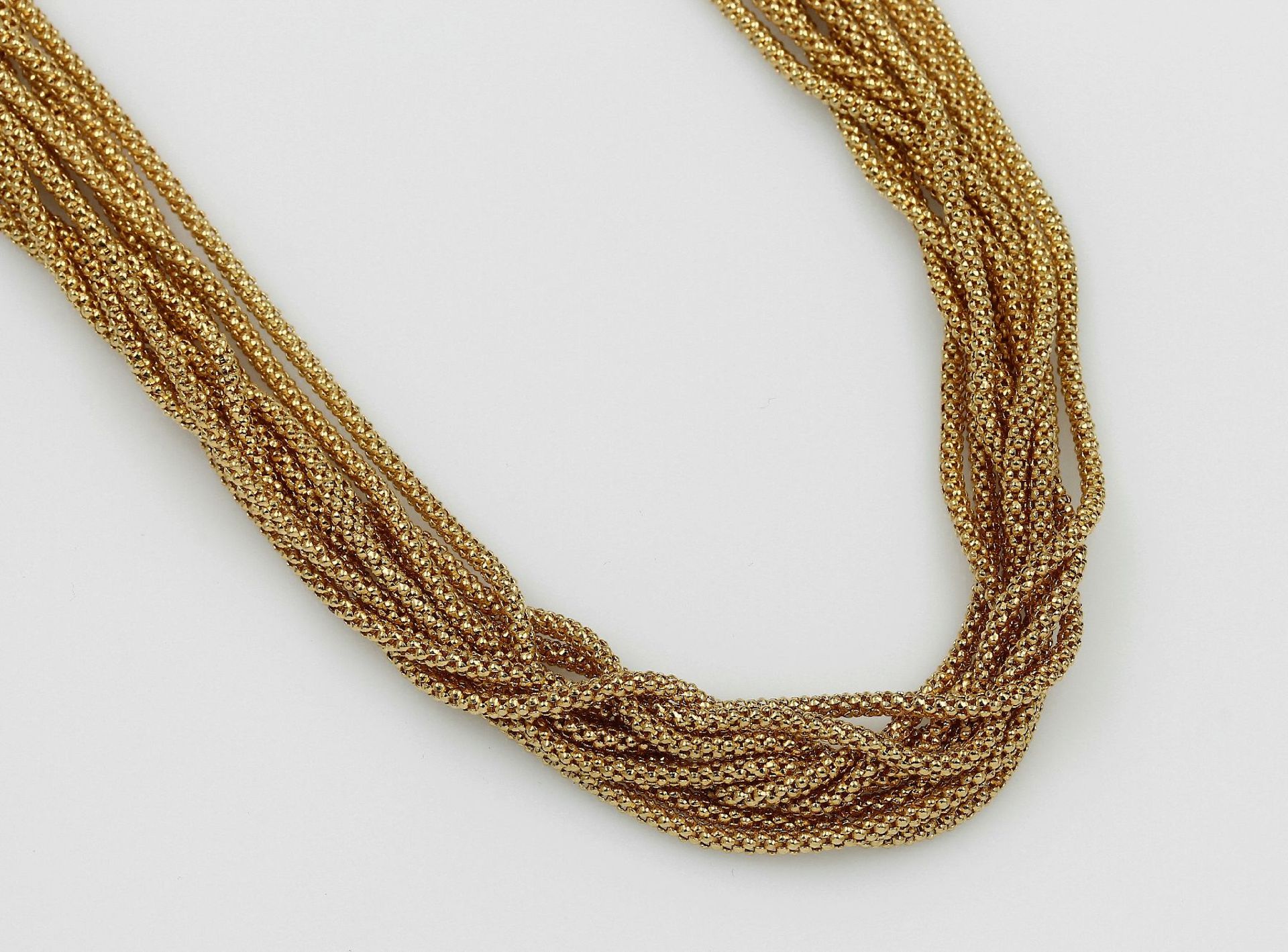 9-rhg. 18 kt Gold Collier, GG 750/000, Stränge in sich strukt. und durchbrochen gearbeitet, L. ca.