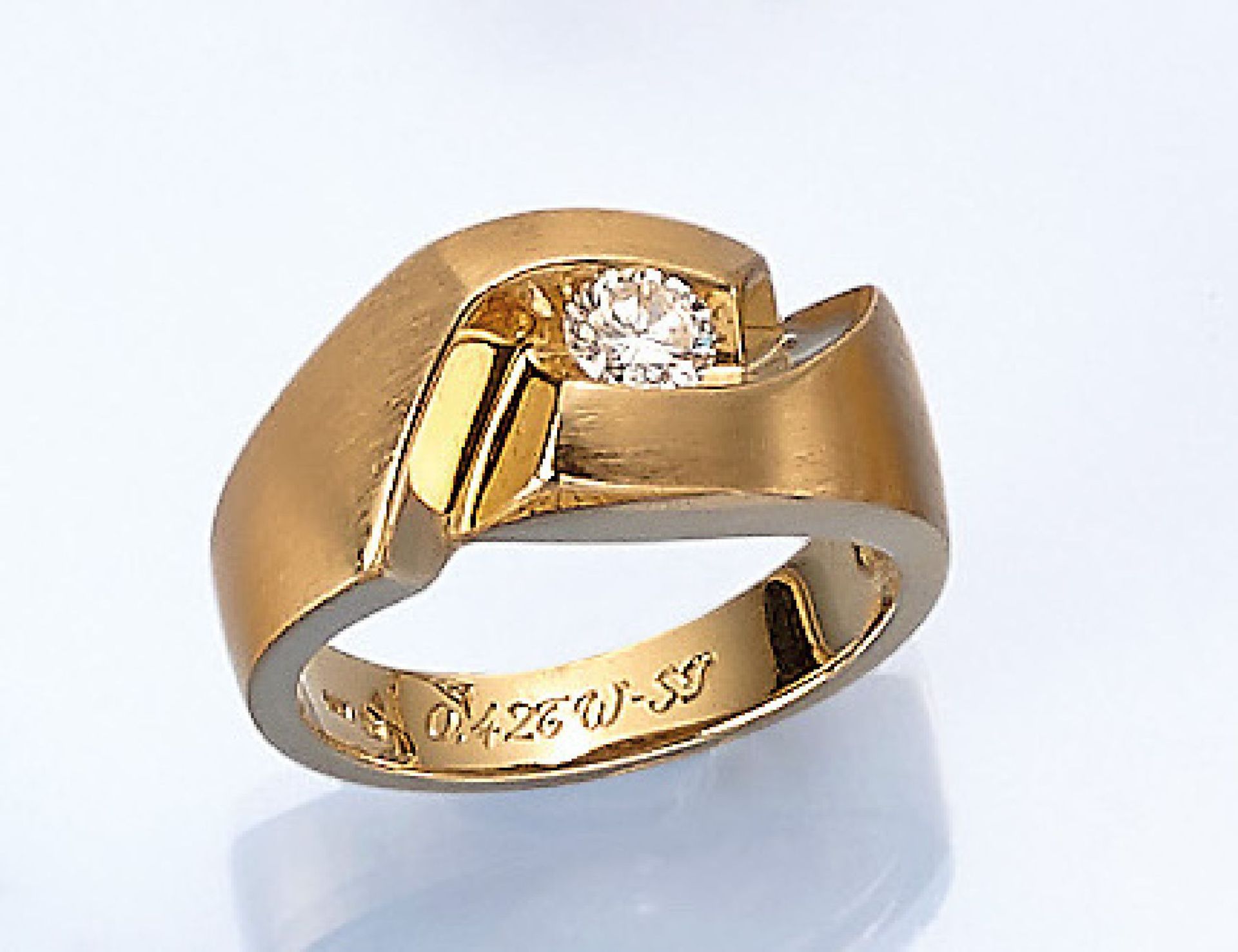 18 kt Gold Ring mit Brillant, GG 750/000, ausgefallenes Design, asymm. Ringschiene, z.T.fein