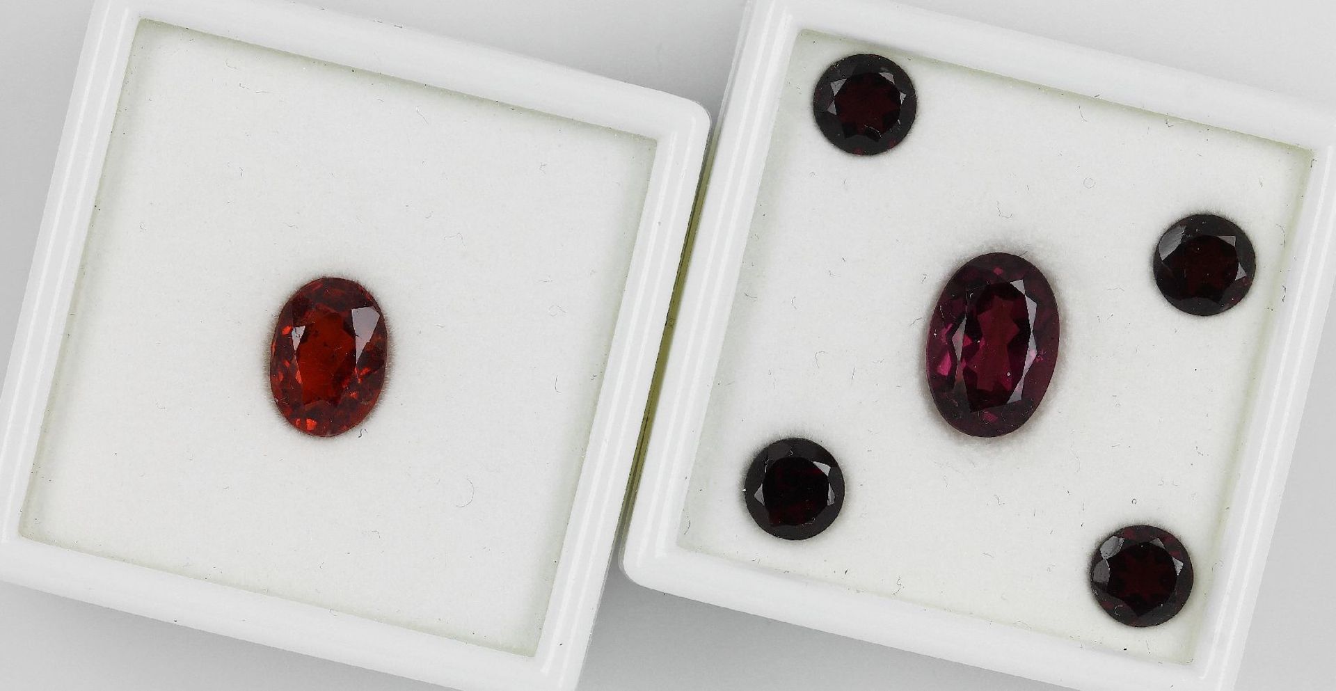 Lot lose Granate, best. aus: 1 x Hessonit Granat, ca. 3 ct, oval facett., 5 x Rhodolit Granate, zus.