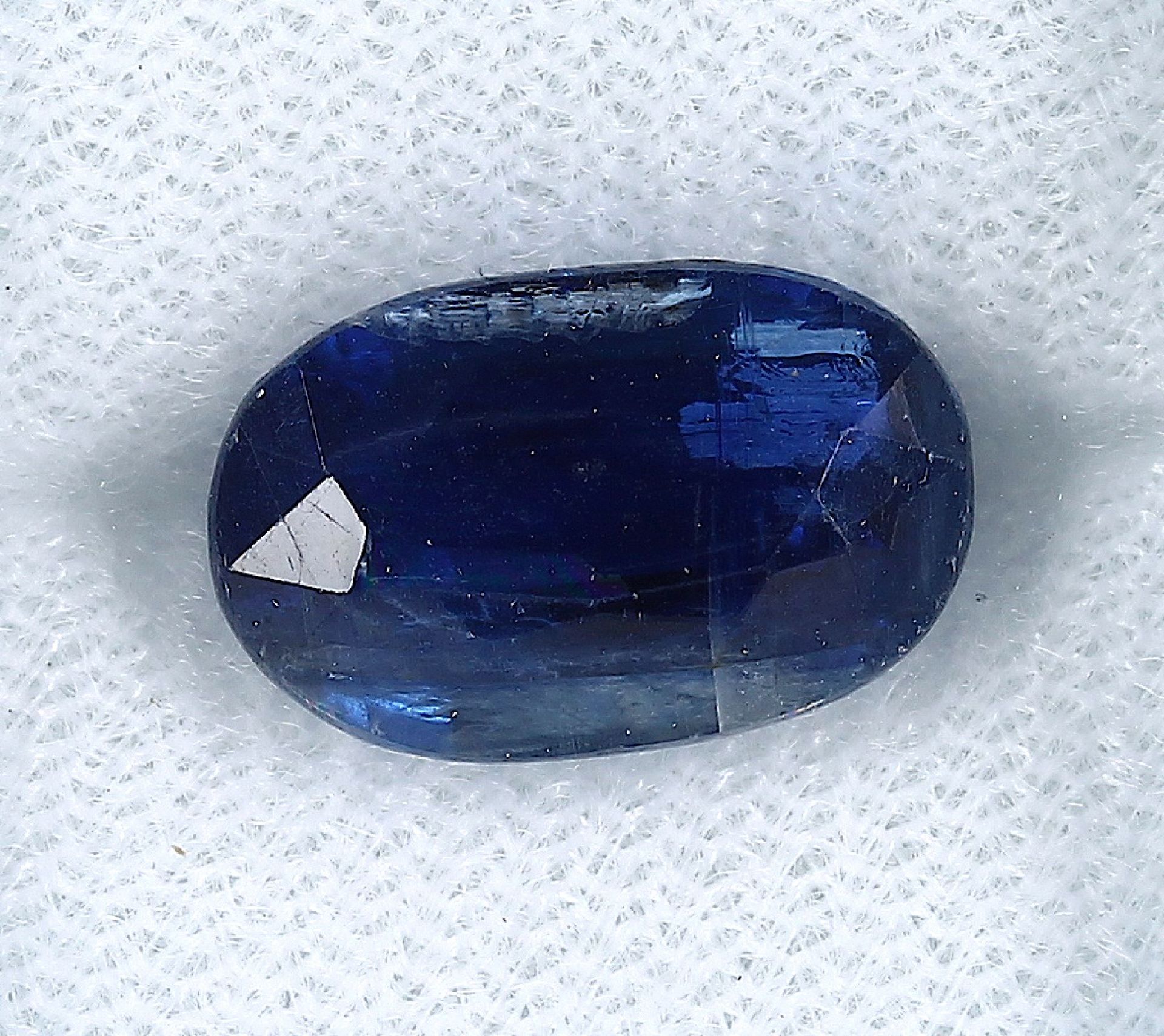 Loser Kyanit, 9.36 ct, oval facett., Blau, unbeh., 13.92 x 8.86 x 7.72 mm, mit PGTL-Expertise