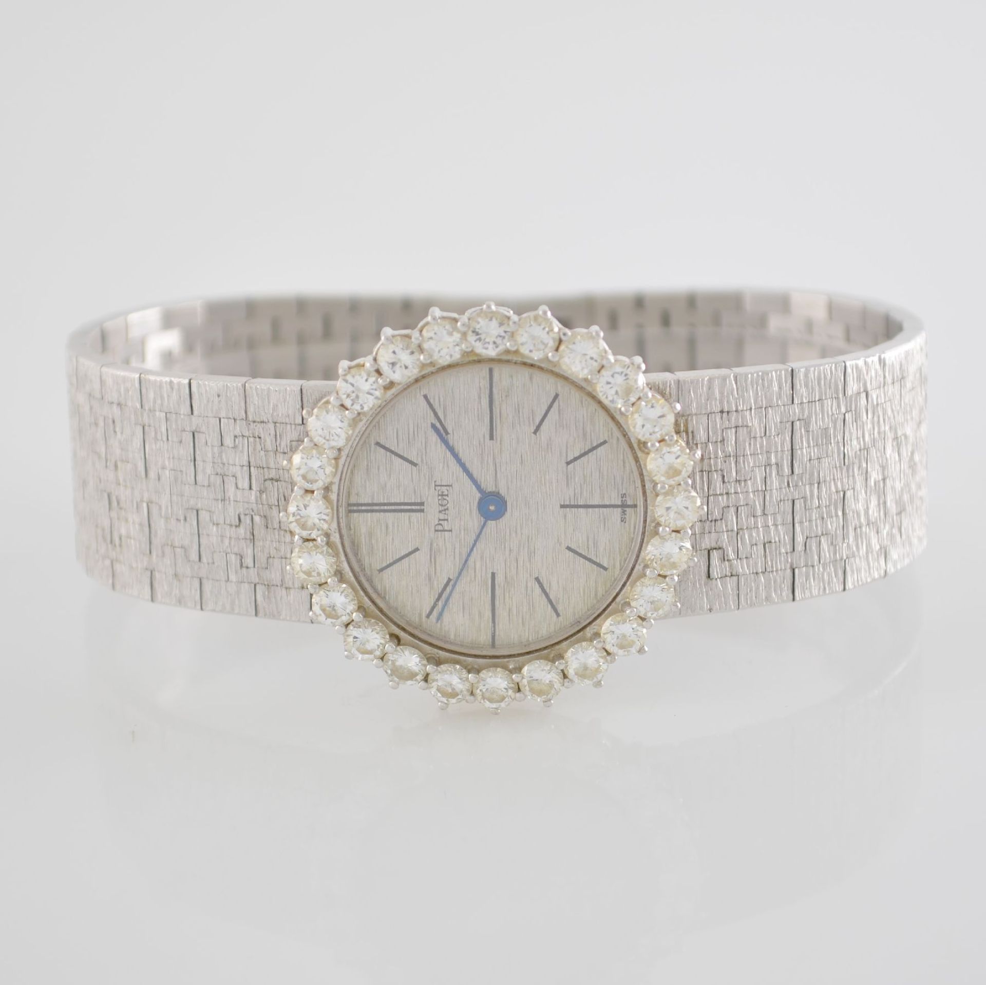 PIAGET feine Armbanduhr in WG 750/000 an Milanaiseband & Diamantlünette, Handaufzug, Schweiz