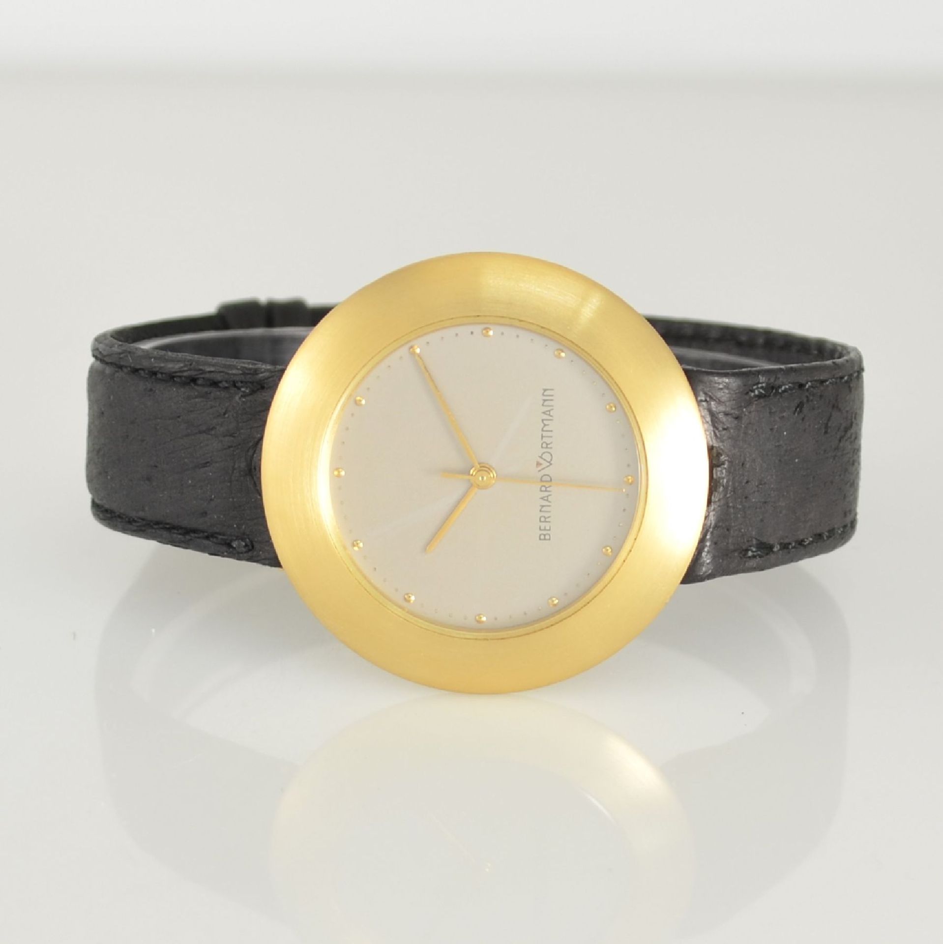 BERNARD VORTMANN Armbanduhr in GG 750/000, Schweiz um 1995, Automatik, Glasboden aufgedr., silb.