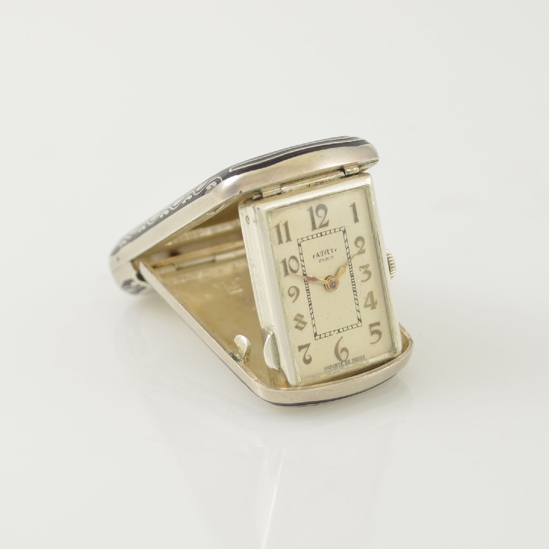 FAUVETY Paris ausklappbare Reiseuhr in Silber , Schweiz um 1930, Handaufzug, guill. & teils lack.