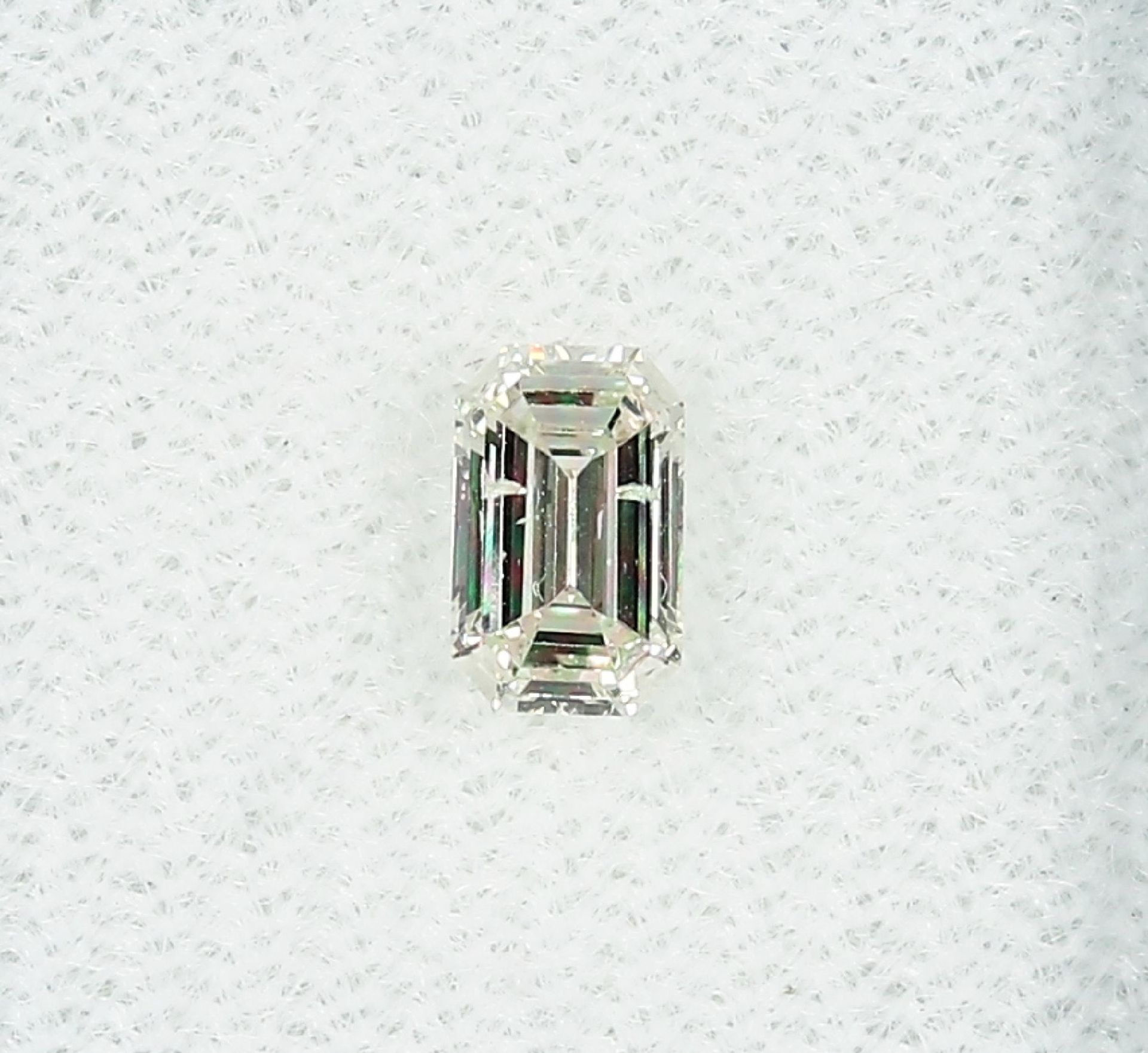 Loser Diamant, 0.54 ct get.Weiß+ (K)/si2, Emerald-Cut, mit HRD-Expertise Schätzpreis: 1350, -