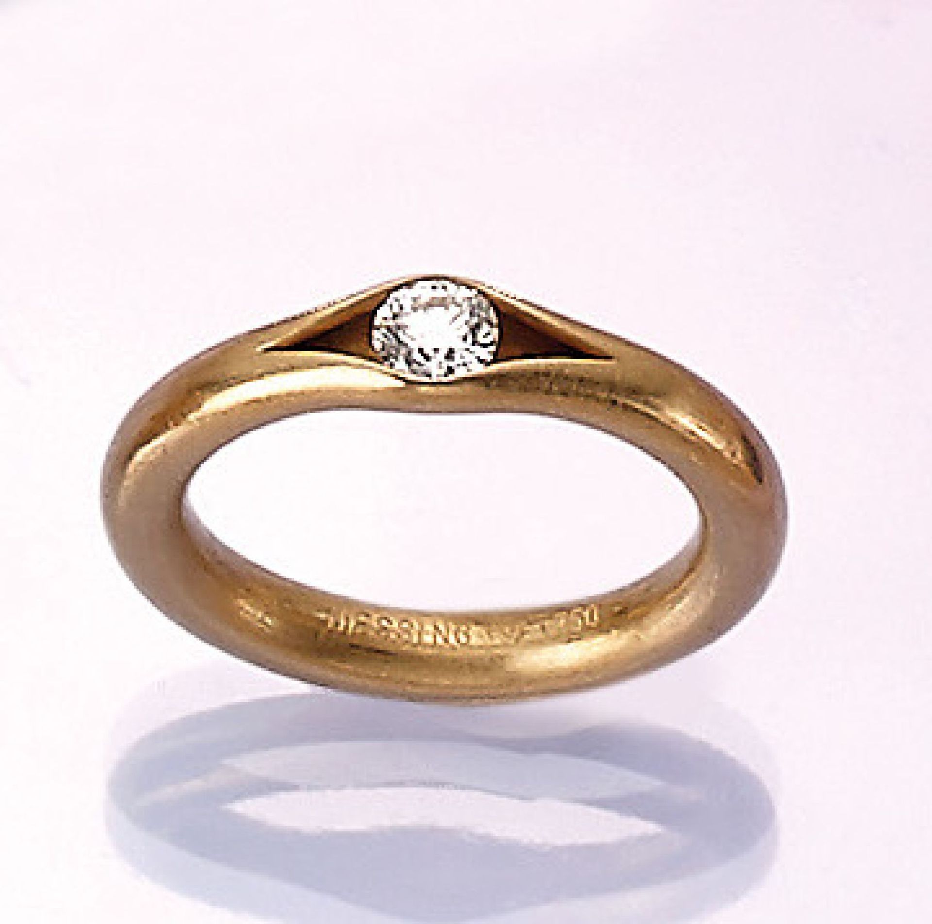 NIESSING 18 kt Gold Ring mit Brillant, GG 750/000, Brillant ca. 0.25 ct feines Weiß/vvs-vs, in