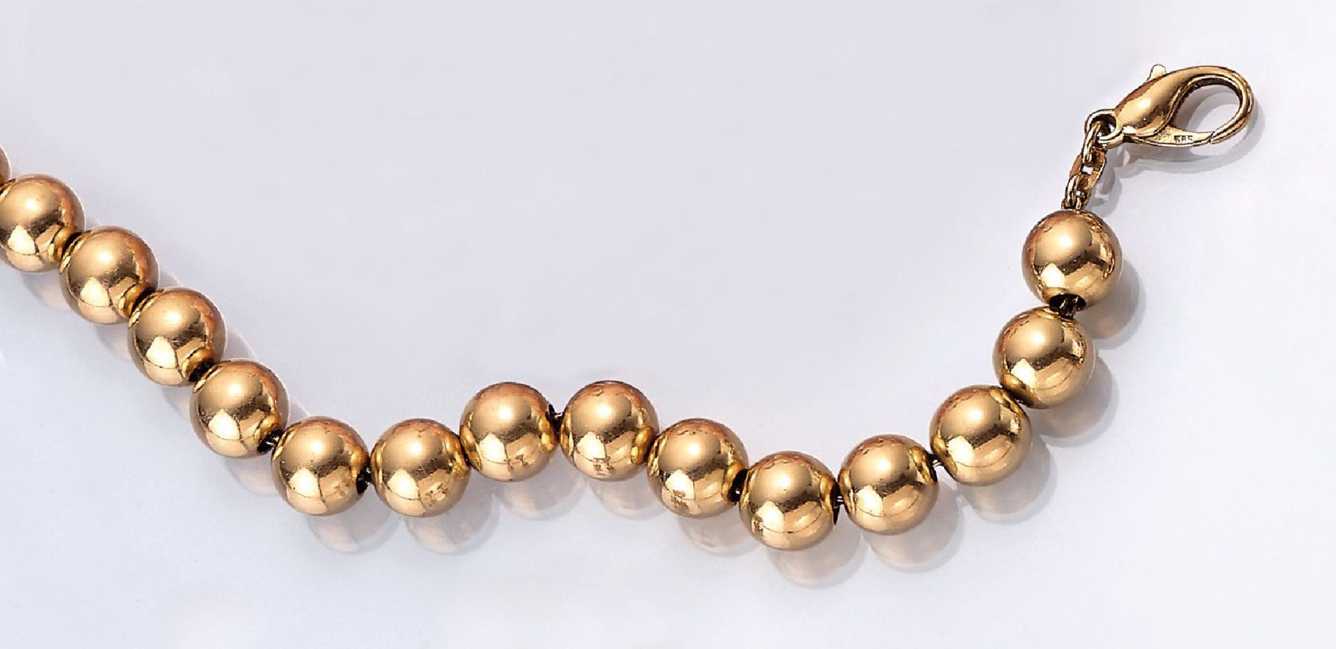 14 kt Gold Kugelarmband, GG 585/000, 17 Kugeln D ca. 9.7 mm, L. ca. 20.5 cm, ca. 39 g14 kt gold