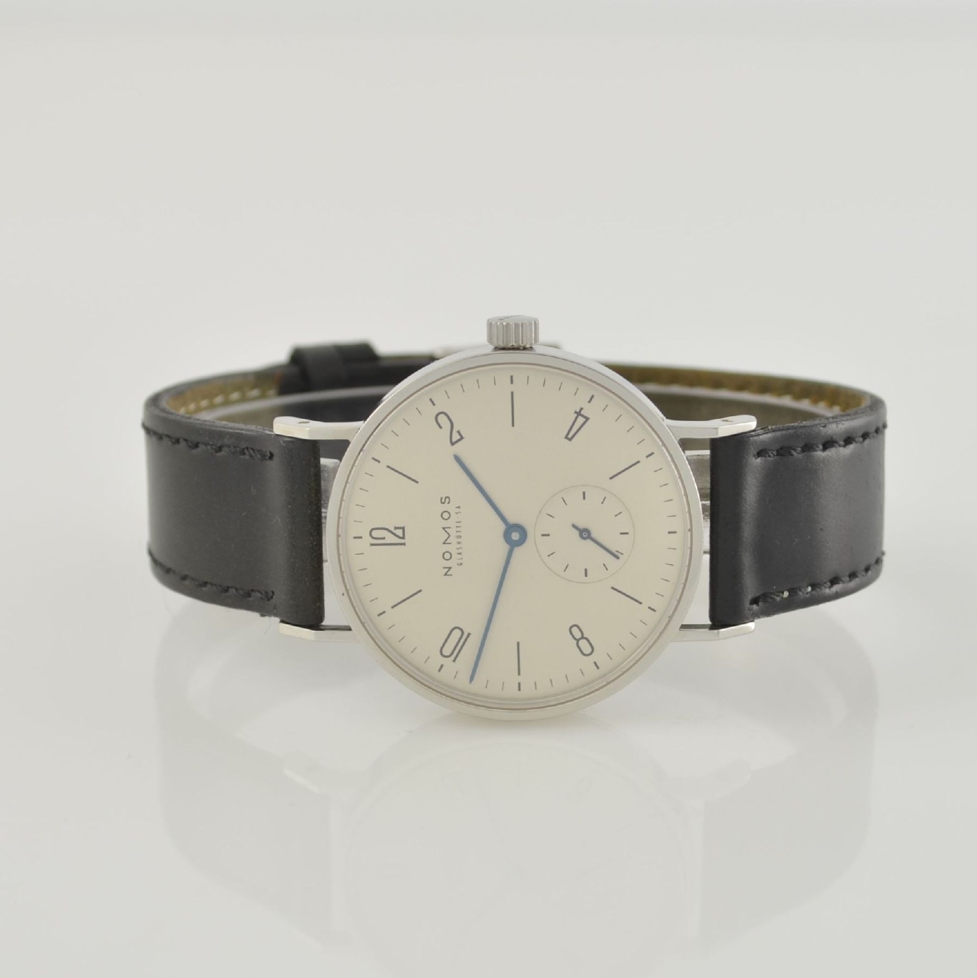 NOMOS Tangente Herrenarmbanduhr, Deutschland um 2010, Handaufzug, Edelstahlgehäuse, Boden