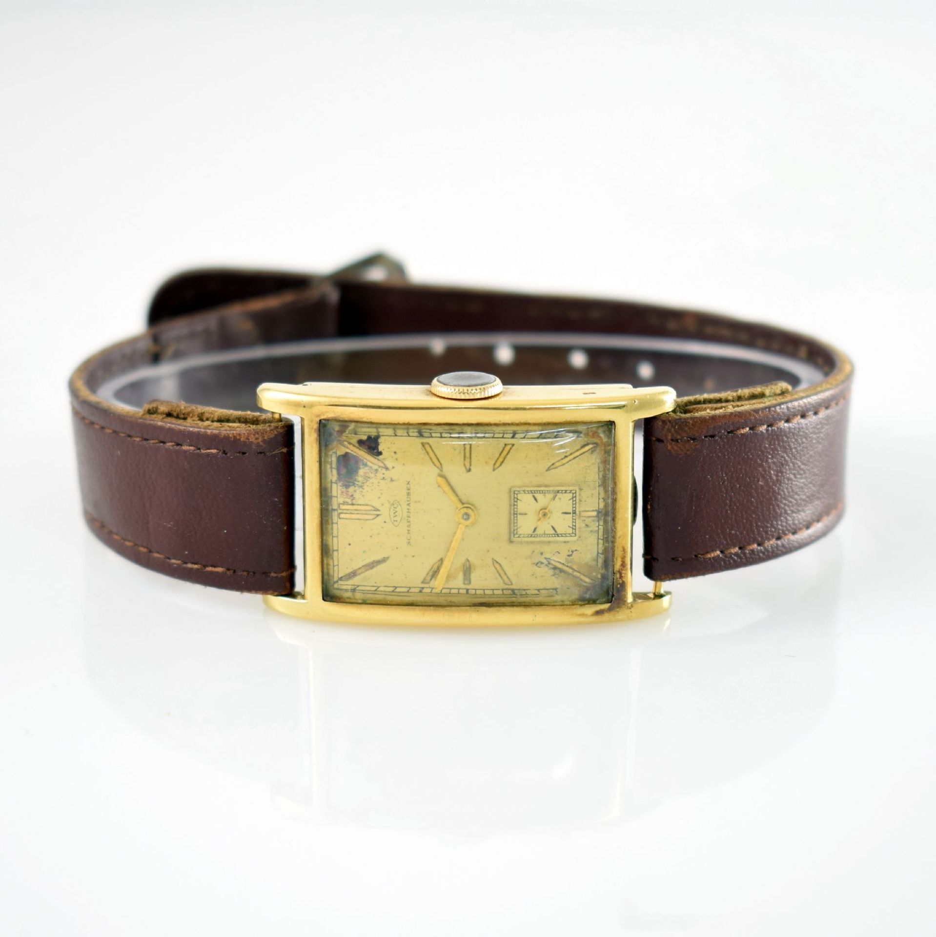 IWC seltene Herrenarmbanduhr in GG 585/000, Handaufzug, Schweiz um 1932, Scharnierboden, Zifferbl.