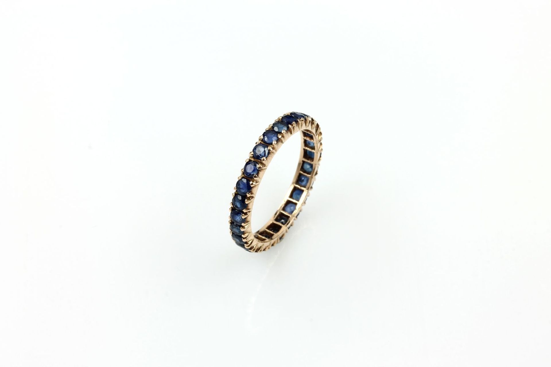 14 kt Gold Memoryring mit Saphiren, RG 585/000, rundfacett. Saphire zus. ca. 1.20 ct, RW 5214 kt