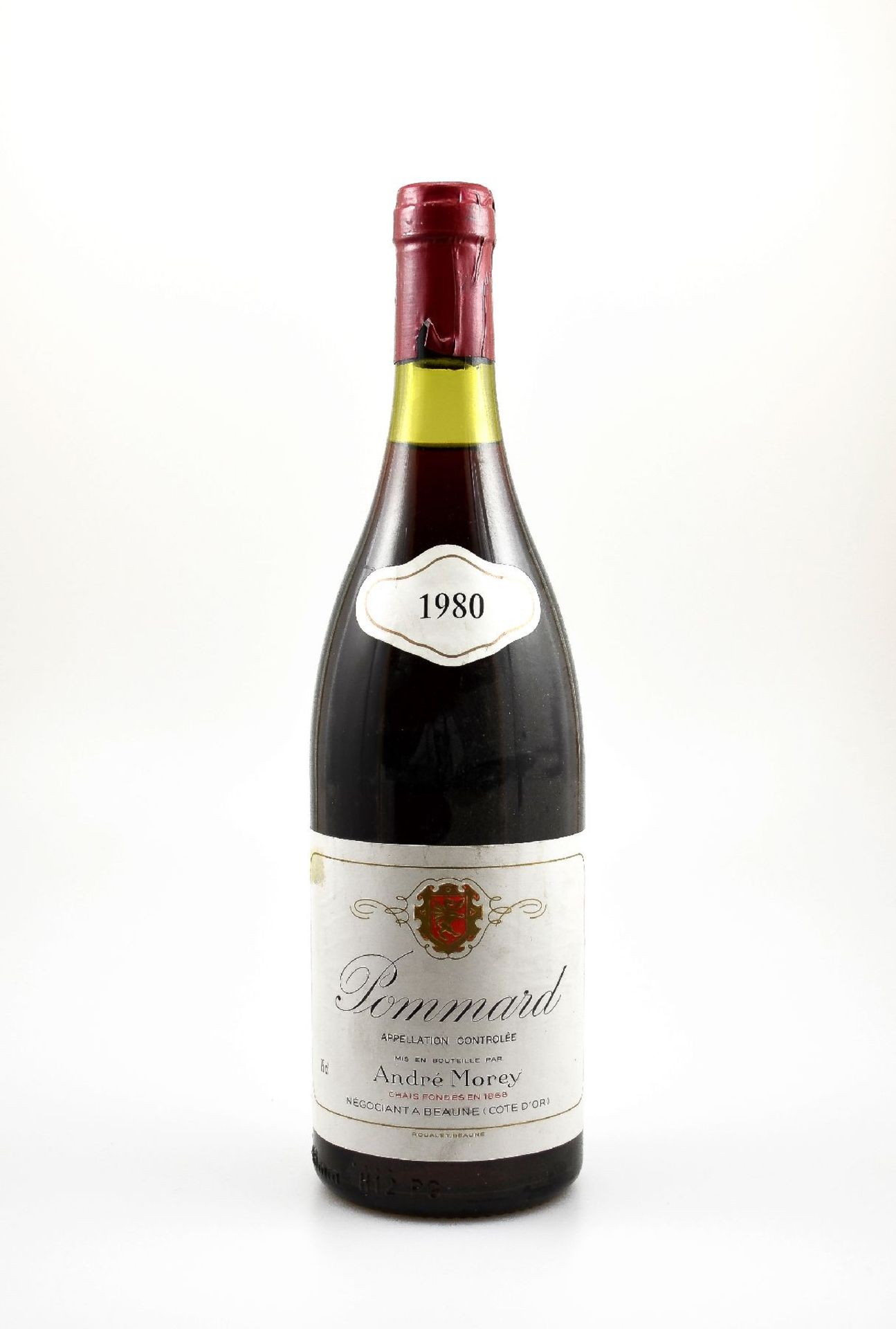 1 bottle 1980 Pommard Andre Morey, approx 75 cl, distance between capsule and wine: approx 2 cm,