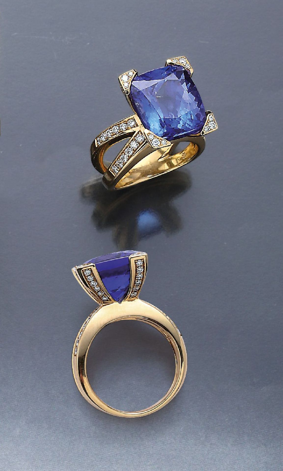 Extraordinary 18 kt gold ring with tanzanite and brilliants , YG 750/000, bevelled tanzanite approx.