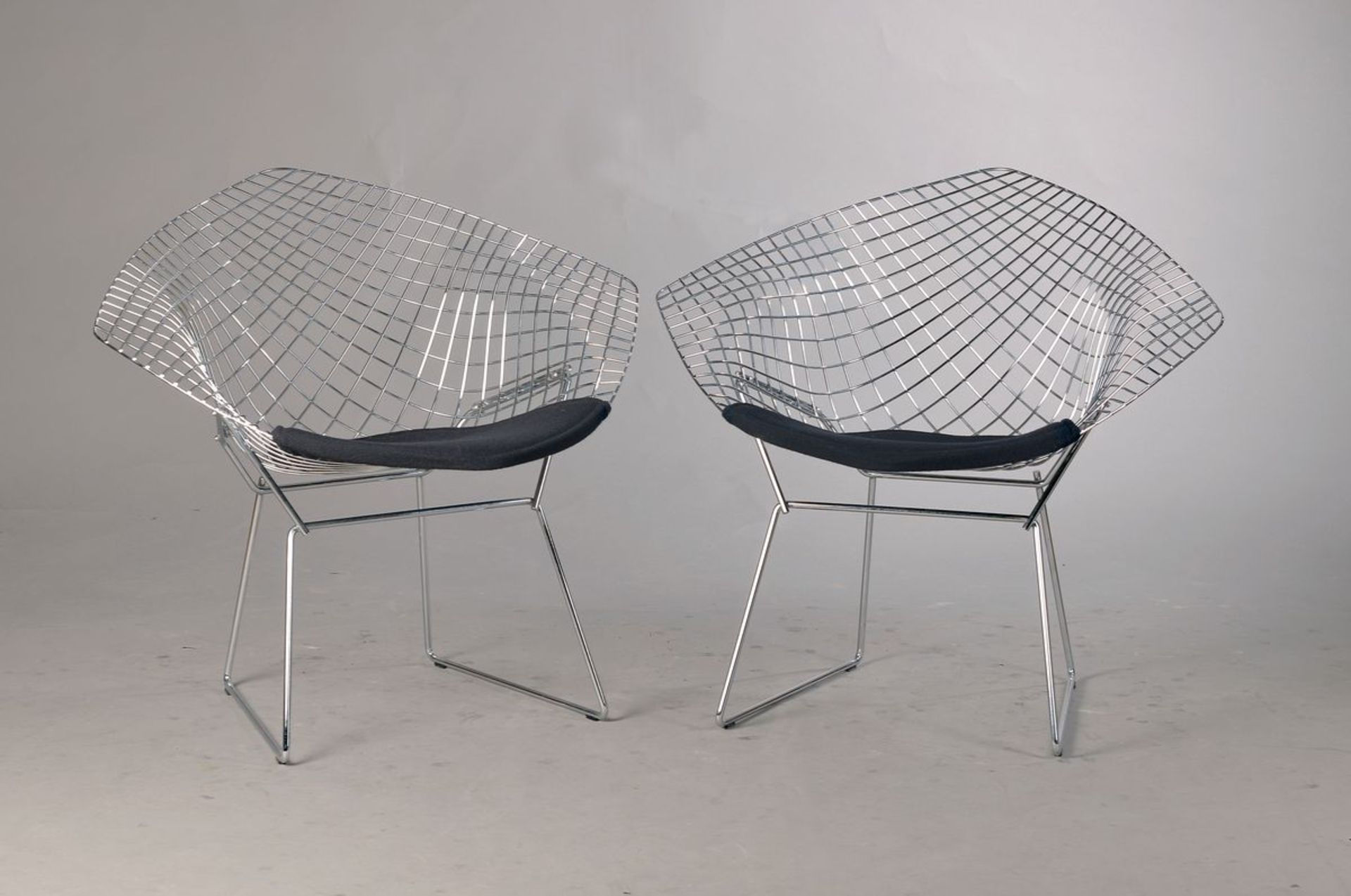 two Diamond Chairs, designed by Harry Bertoia 1950/52, execution: beginning 1990s, chromed steel