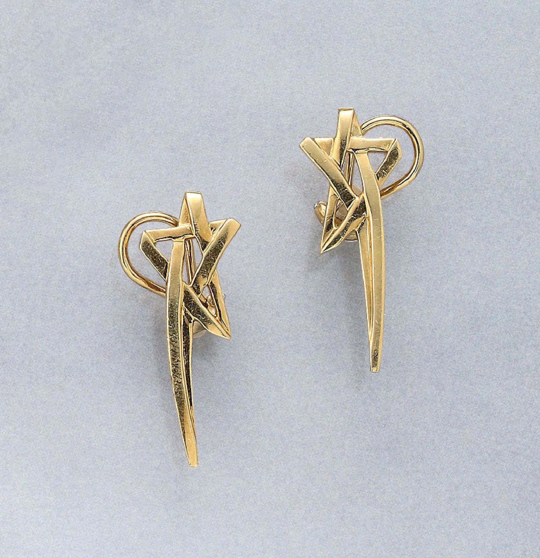 Pair of 18 kt gold Tiffany & Co earrings , by Paloma Picasso, YG 750/000, abstr. star shaped,