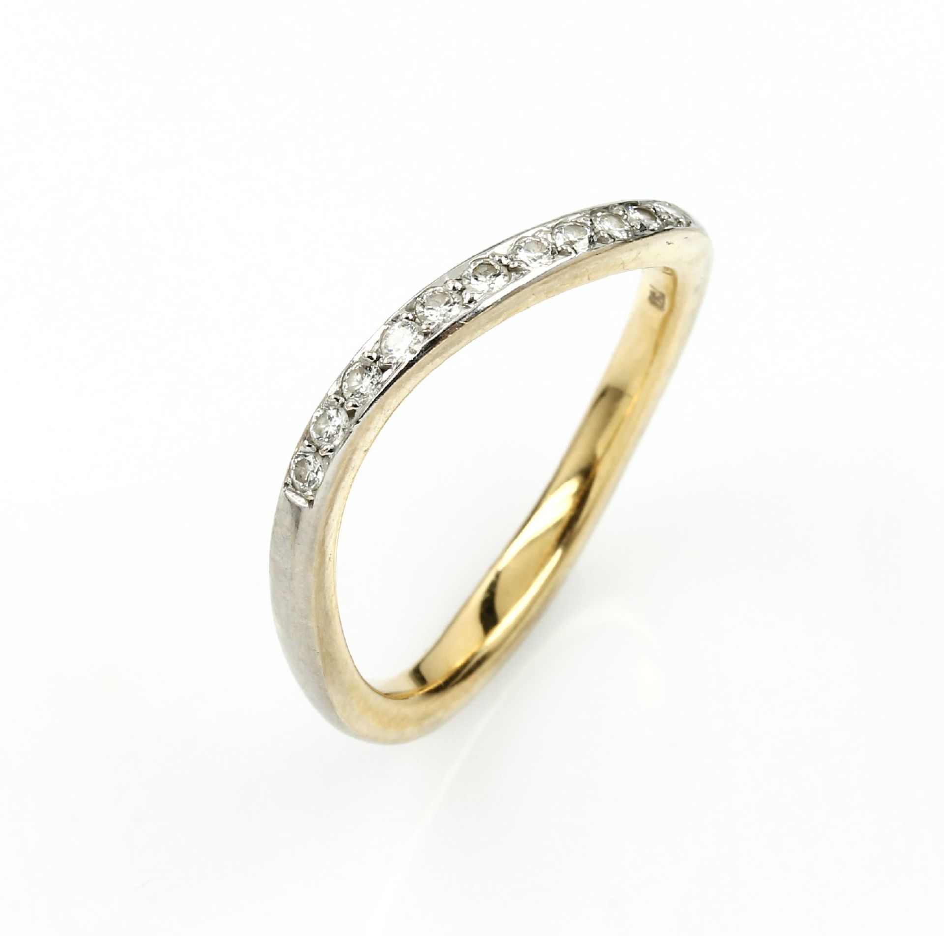 18 kt gold ring with brilliants , YG/WG 750/000, 11 brilliants total approx. 0.22 ct Wesselton/si,