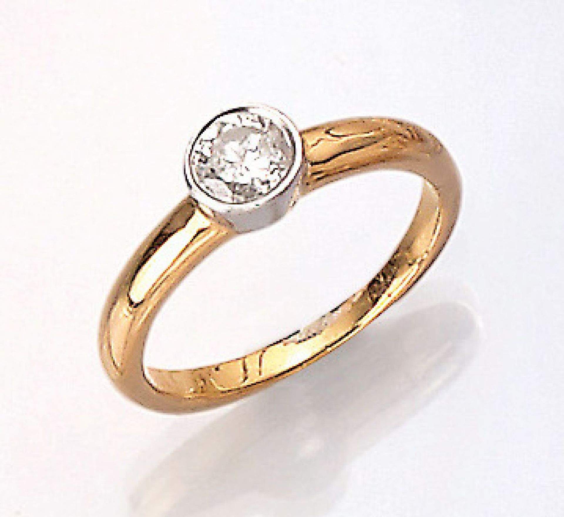 18 kt gold ring with brilliant , YG/WG 750/000, brilliant approx. 0.52 ct Wesselton/p, embossed in