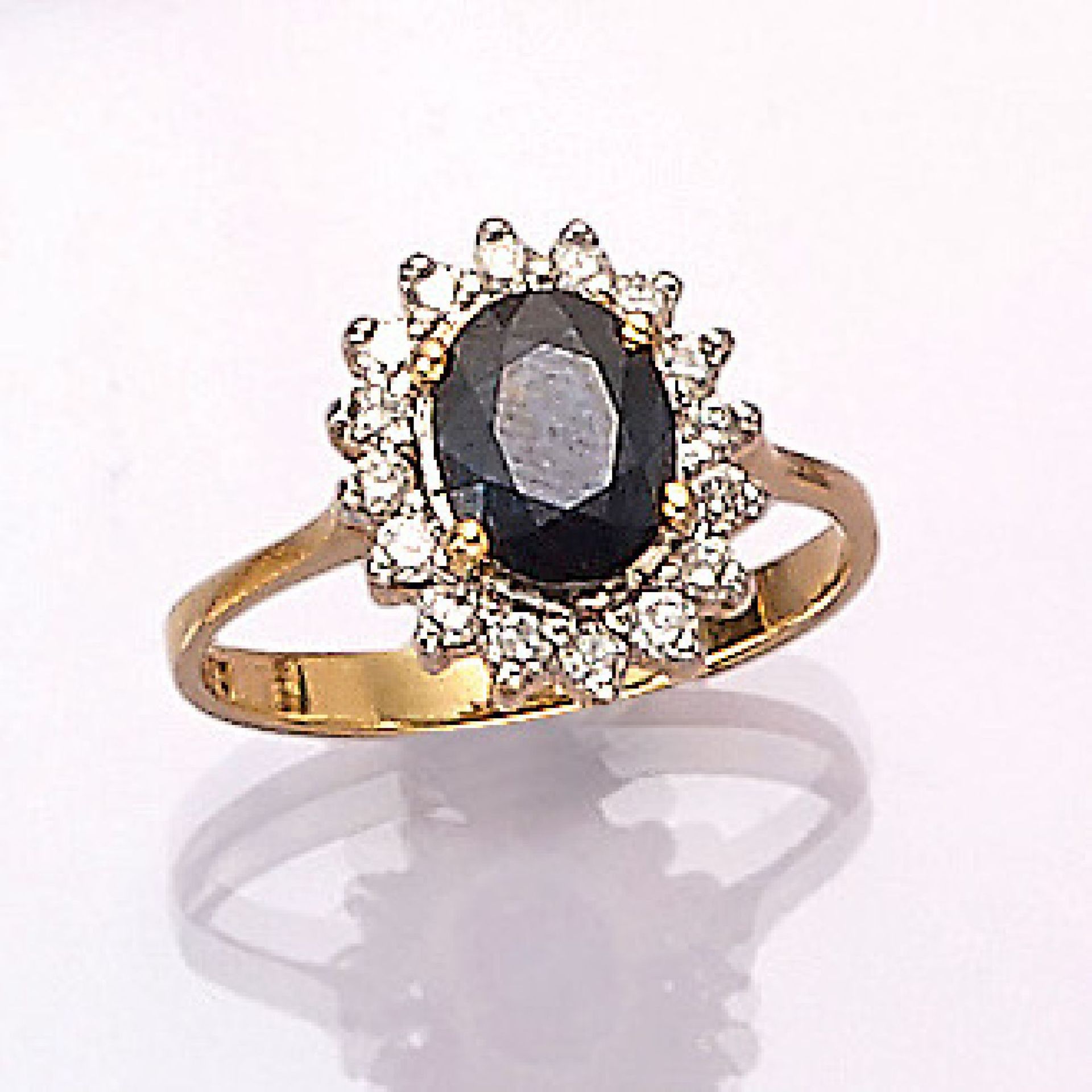 18 kt gold ring with sapphire and brilliants , YG 750/000, oval bevelled sapphire approx.0.80 ct,