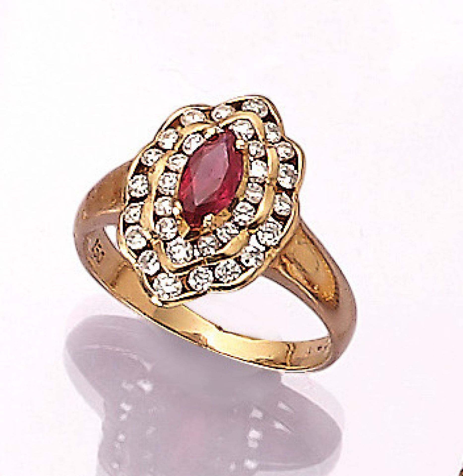 18 kt gold ring with brilliants and ruby , YG 750/000, centered ruby marquises approx. 0.25 ct,