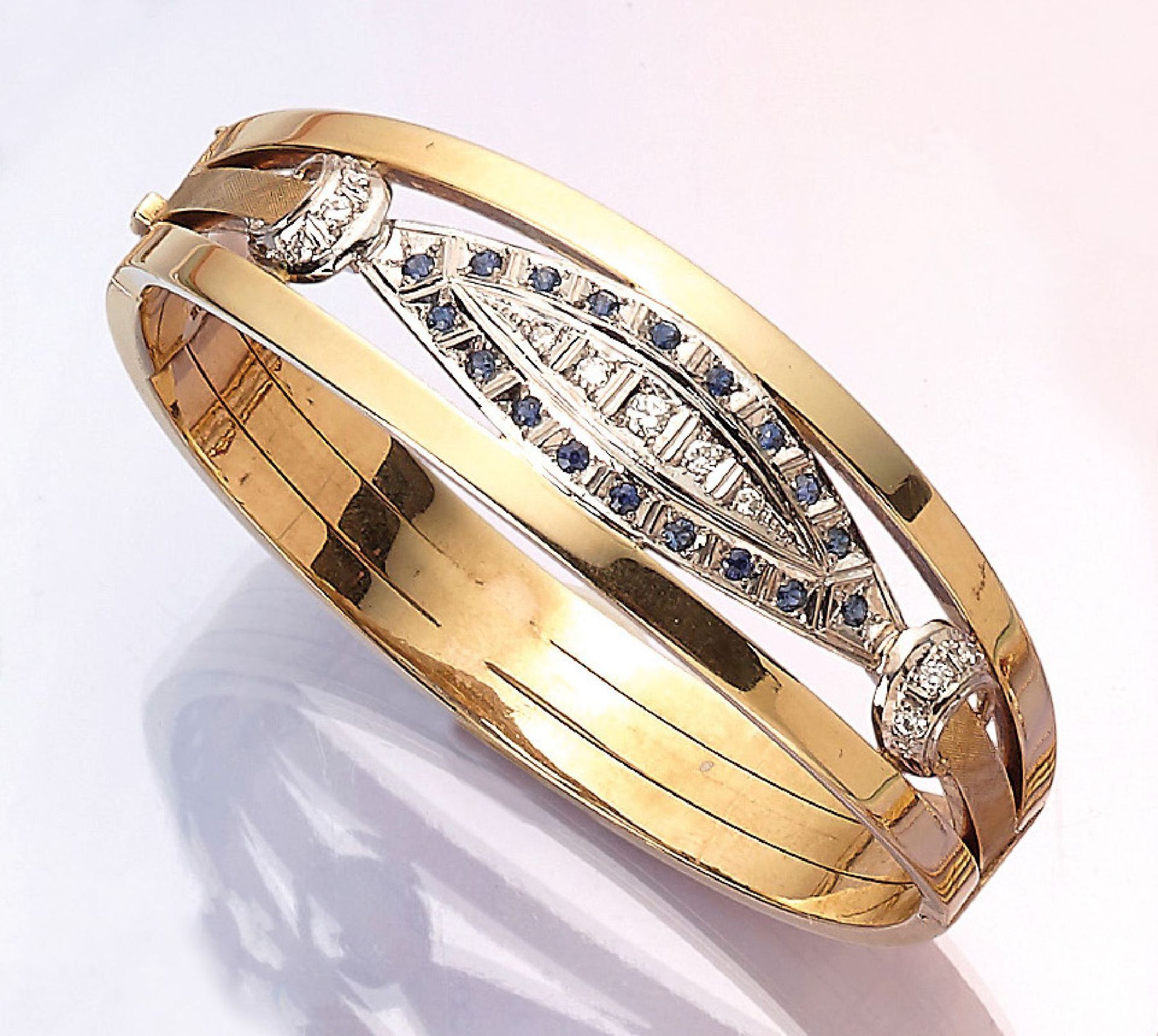 14 kt gold bangle with sapphires and diamonds , YG/WG 585/000, 11 brilliants total approx.0.35 ct