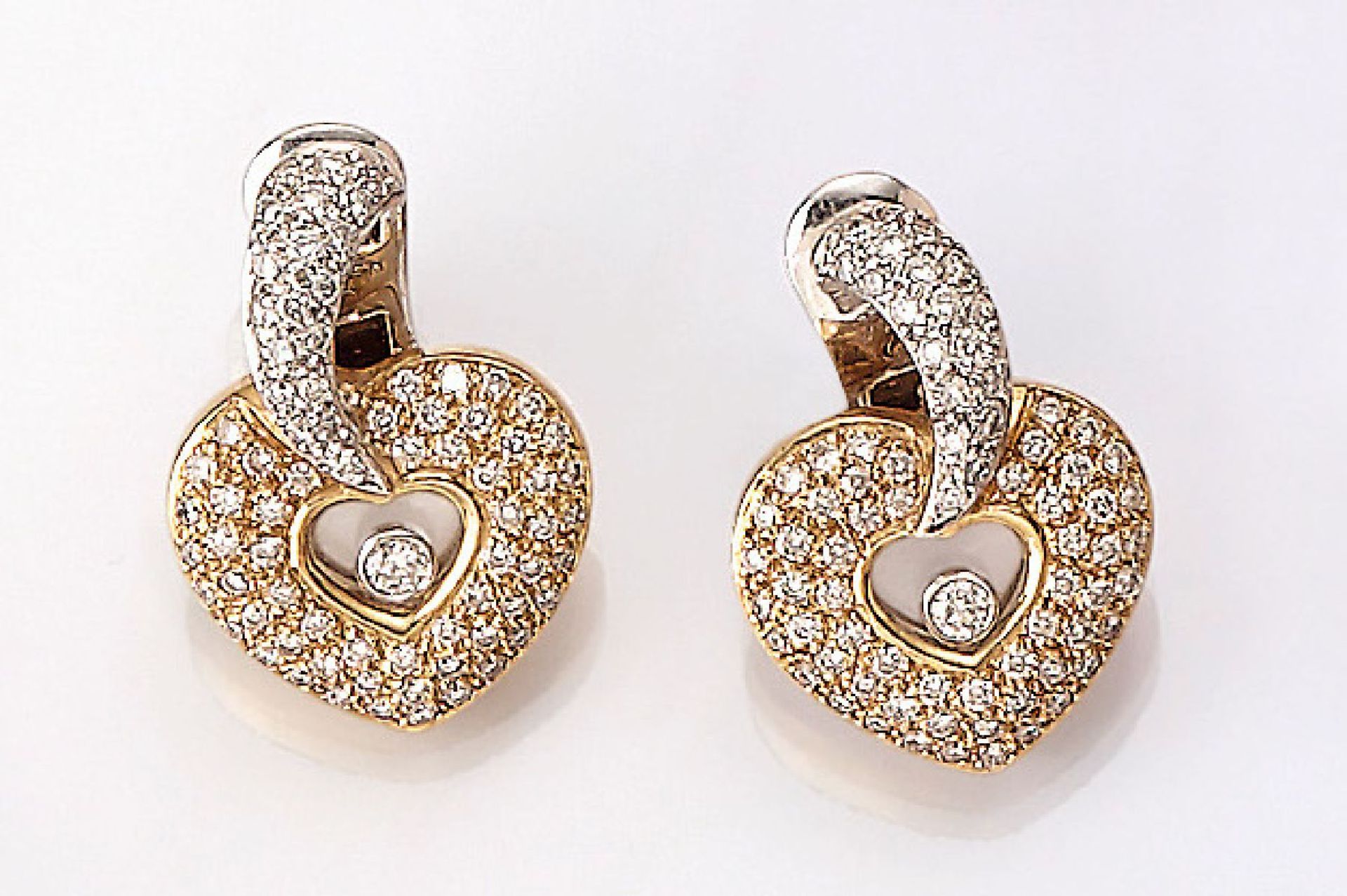 Pair of 18 kt gold earrings "hearts" with brilliants, YG/WG 750/000, brilliants totalapprox. 1.20 ct