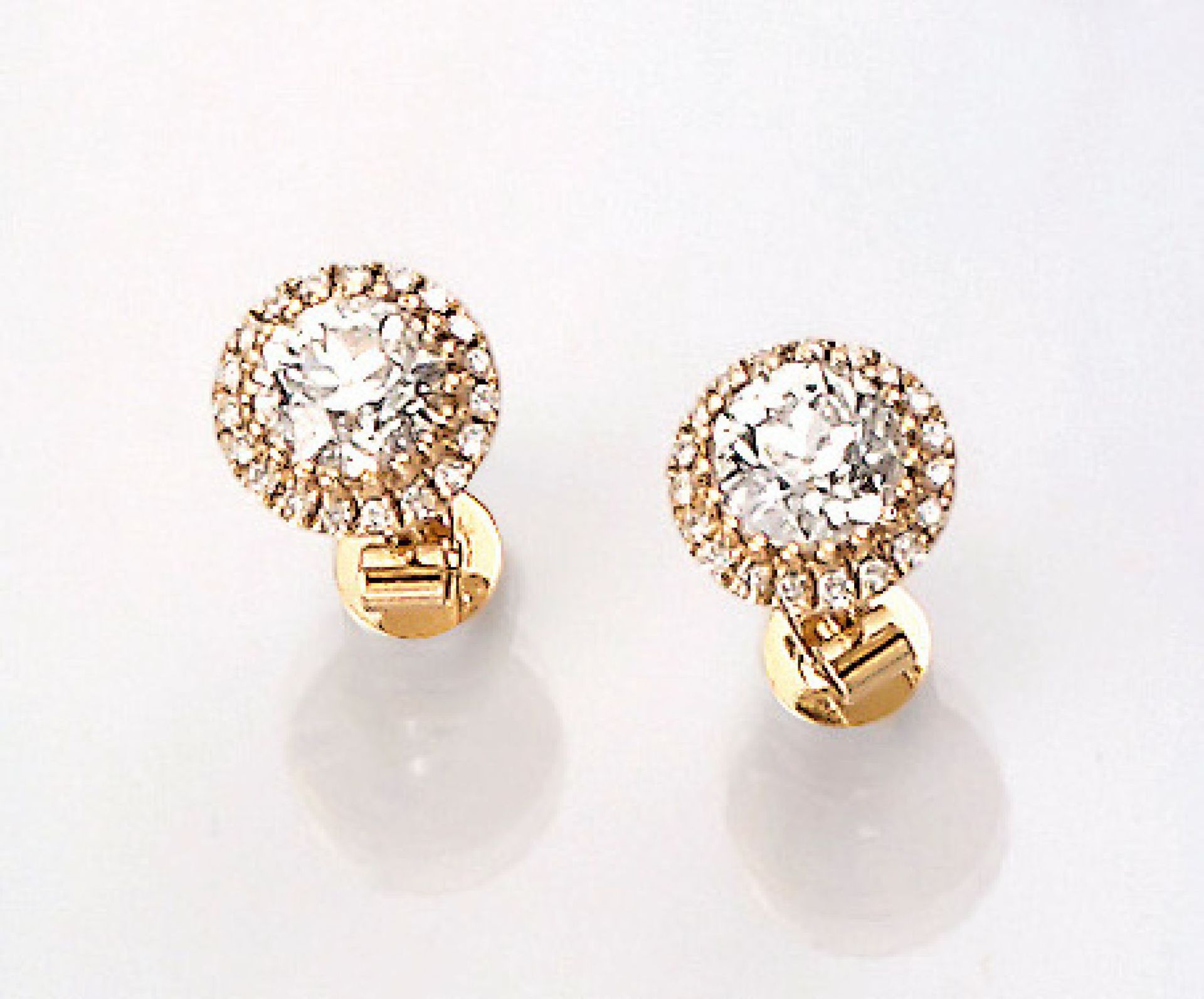 Pair of 18 kt gold earrings with diamonds , YG 750/000, centered 2 old cut diamonds total approx.