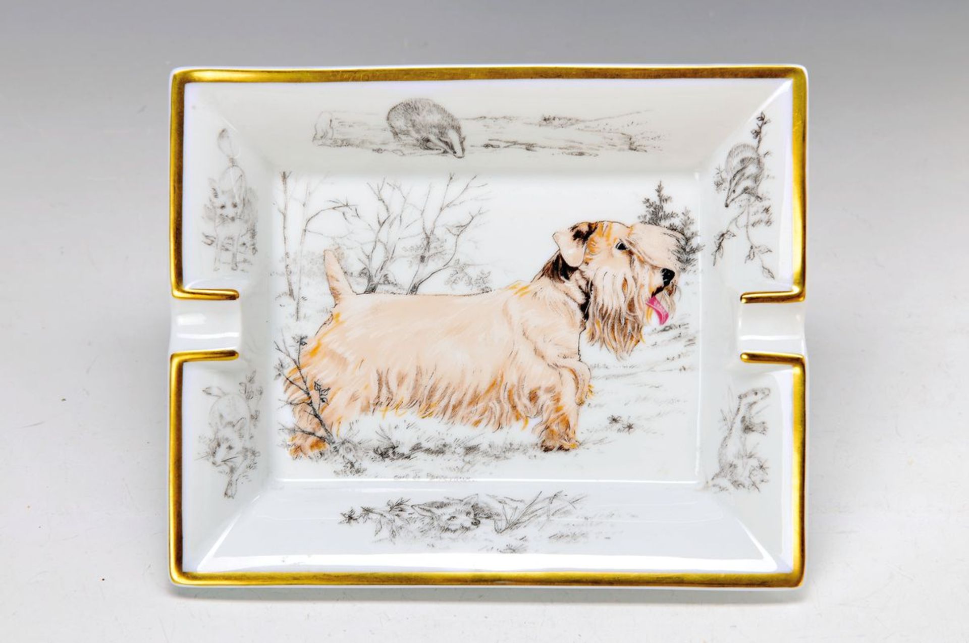 ash-tray, Hèrmes Paris, porcelain, with dogs motif, gold rim, approx. 3.5x19x16cm