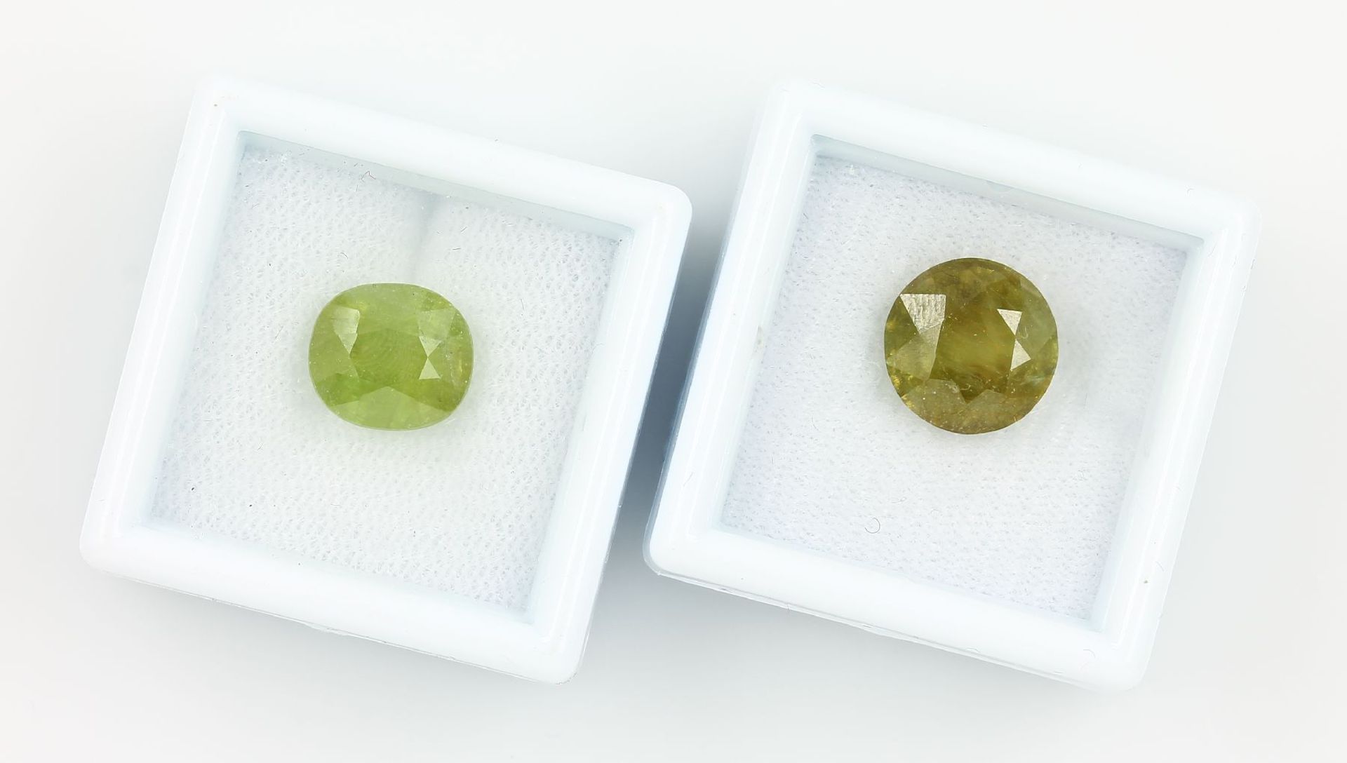 Lot 2 loose sphene total approx. 9.50 ct, oval- and round bevelled Valuation Price: 420, - EUR