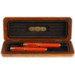 Parker Duofold special edition in orange laquer, rollerball pen and fountain pen with 18kt gold nib,
