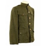 Vest model 1917, voorzien van Belgische knopen, onderste zakken beschadigd, met wat motschade