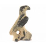A small statuette of a Roman eagle (ca. 3.5 cm.), holed