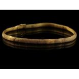 14kt geelgouden armband met gevlochten schakel - lengte 19,5 cm