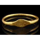 A circa 20kt yellow gold ring, inscribed with the word 'Vivas', possibly Roman era