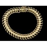 14kt geelgouden armband met gevlochten fantasieschakel - lengte 18,5 cm