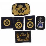Klein lot bestaande uit circa zes emblemen KLM, diverse periodes