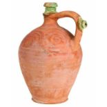 Terracotta kruik met deels geglazuurde hals en greep, versierd met cirkel decor, vermoedelijk