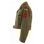 Jacket, Canada, battle Dress, voorzien van diverse emblemen, papieren label, slecht leesbaar