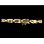 14kt bicolour gouden schakelarmband met fantasieschakels - lengte 16,5 cm -