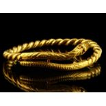 18kt geelgouden armband in slangvorm - omtrek 16 cm