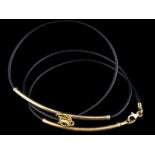 Lederen collier en bijbehorende armband met 14kt gouden monturen