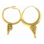 Two decorative Roman gold earrings, each with bunch of grapes, 1st-3rd century AD, we believe an