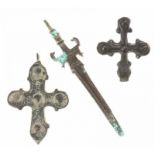 A lot with 2 early Christian crosses, added a bronze artefact in the shape of a sword (with