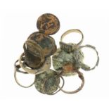 A small lot with 8 (ancient) rings, a bronze applique and 6 small Roman mainly provincial coins in