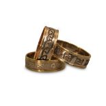 COLLECTION OF CELTIC PATTERN 9CT GOLD AND SILVER RINGS