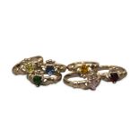 SIX SILVER AND GEM SET CLADDAGH RINGS